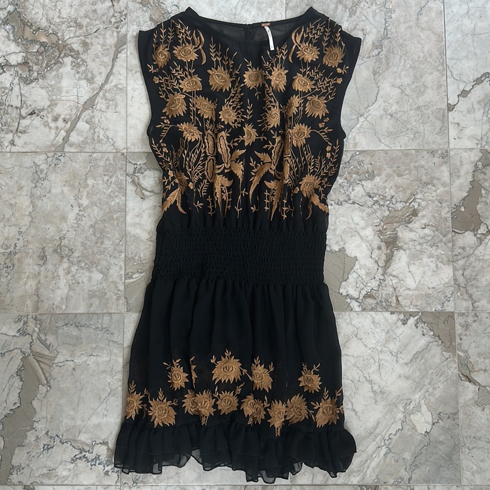 Free People sheer little black dress with semi open back